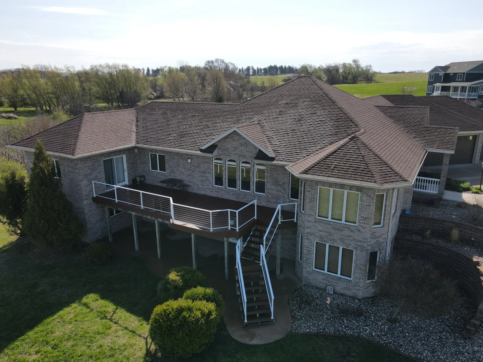 Brick and stone home with a walkout deck in Spirit Lake, Iowa