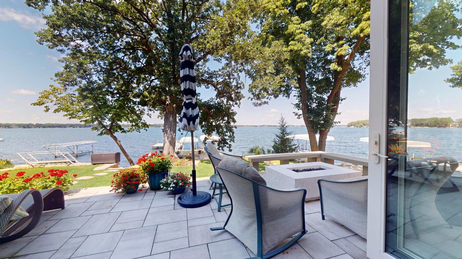 Lakefront property on West Okoboji with dock and blue water — Iowa Great Lakes real estate