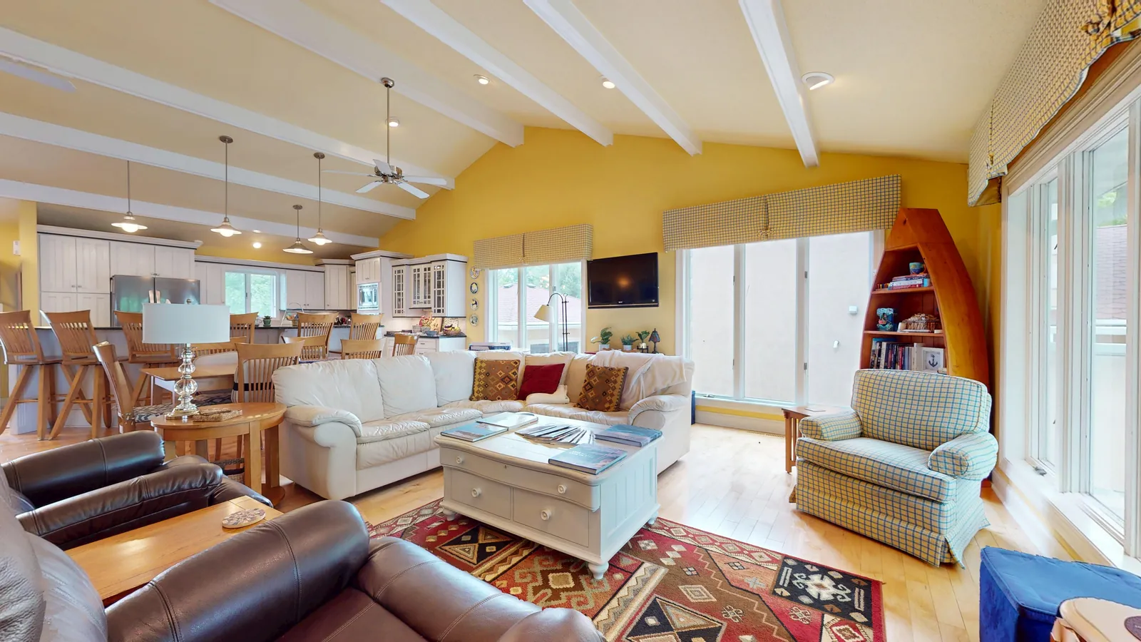 Bright living room of an Okoboji, Iowa lake home with vaulted ceilings