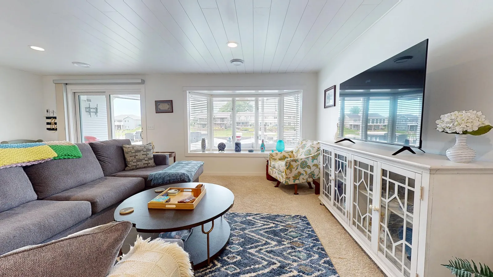 Light-filled living room of a harbor home in Spirit Lake, Iowa